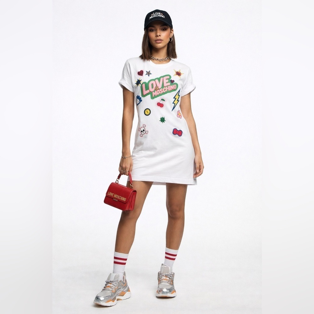 Love Moschino white t-shirt mini length logo dress with sequin appliqués. Size 2